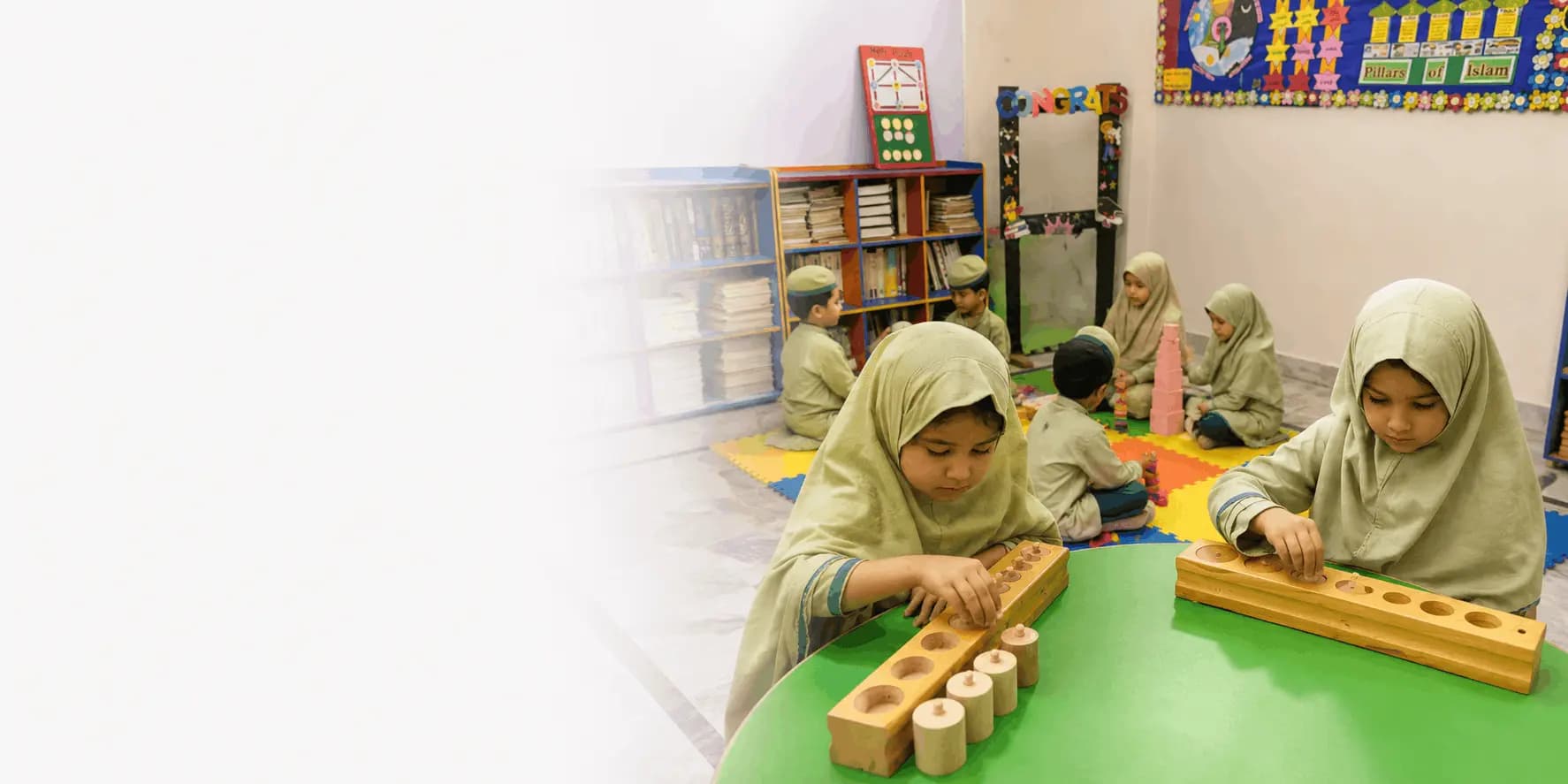Children learning in a classroom at Jamia Hassan Bin Sabit