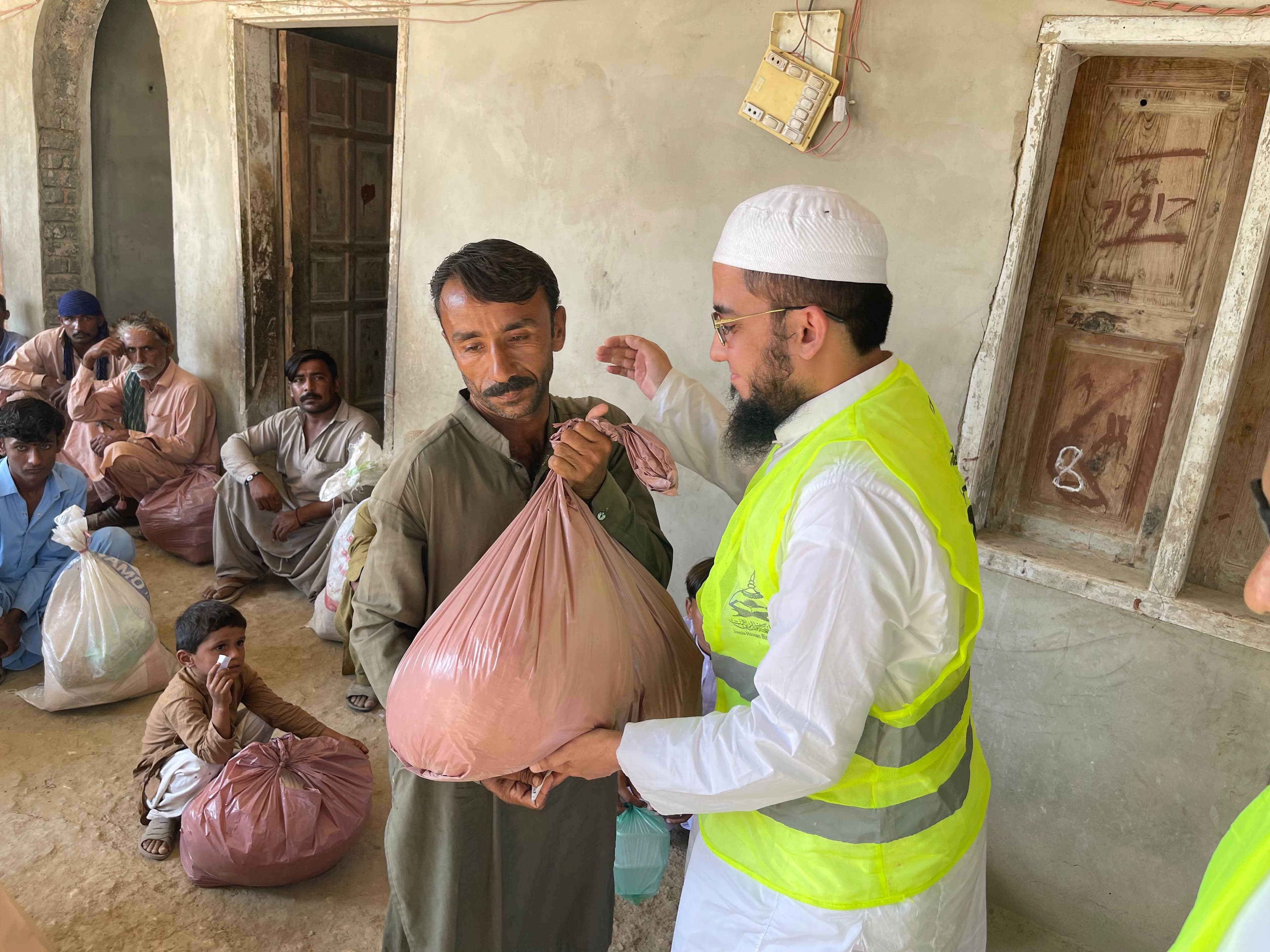 HBSMWA team distributing aid